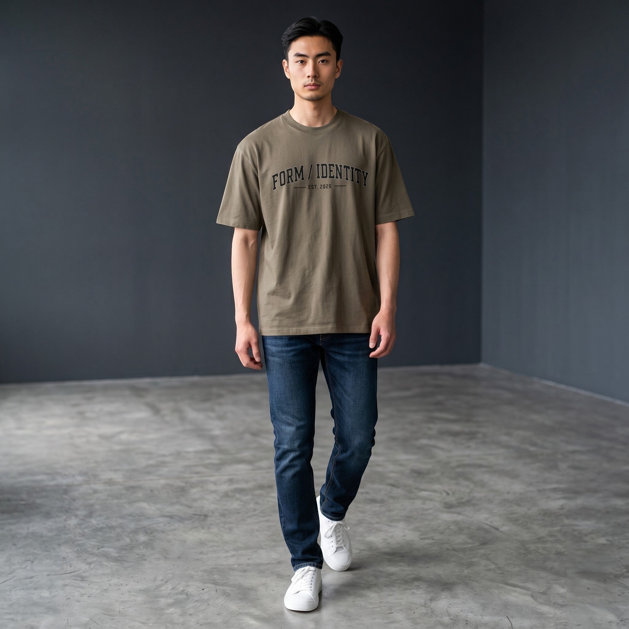 Omina Studio heavyweight cotton t-shirt in taupe with "FORM / IDENTITY EST. 2026" graphic on chest.
