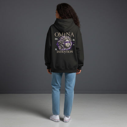 OMINA Studio black heavyweight cotton hoodie with a large graphic of Medusa and the text "Move With Intention" on the back.