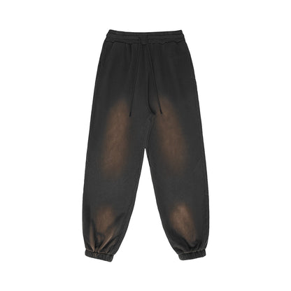 Omina Studio vintage-inspired heavyweight sweatpants in charcoal with a washed-out effect and adjustable drawstring.