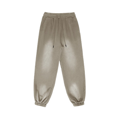 Omina Studio vintage-inspired heavyweight sweatpants in a washed taupe color. Relaxed fit with elastic waistband and drawstrings.