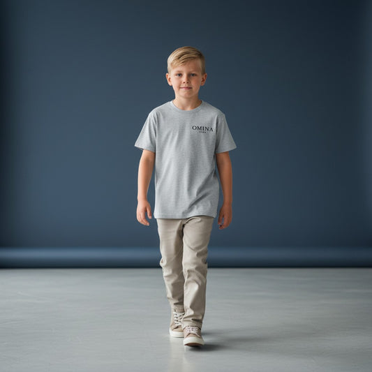 Omina Kids grey Sorona quick-dry cooling t-shirt with minimal logo on chest. Soft, breathable, and lightweight.