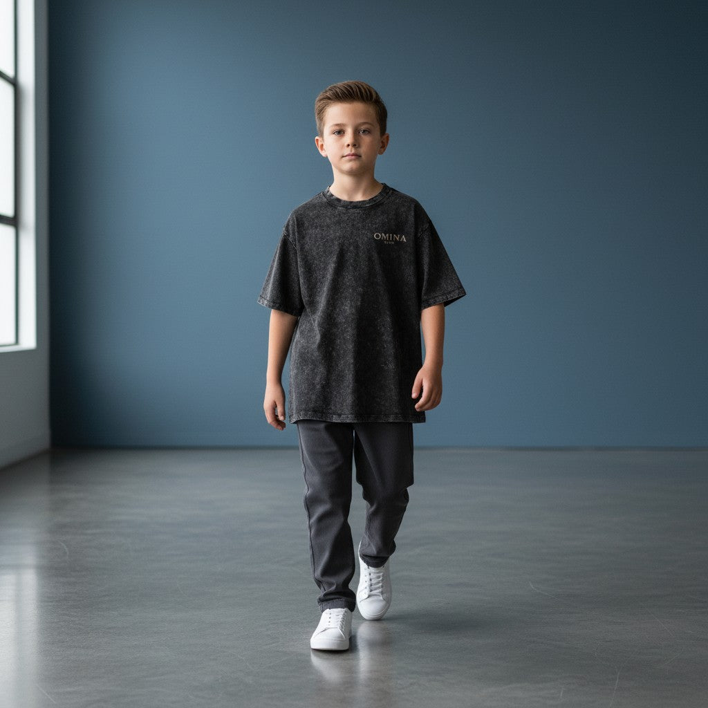 Omina Kids snow washed charcoal grey 100% cotton loose fit t-shirt with short sleeves and round neck.