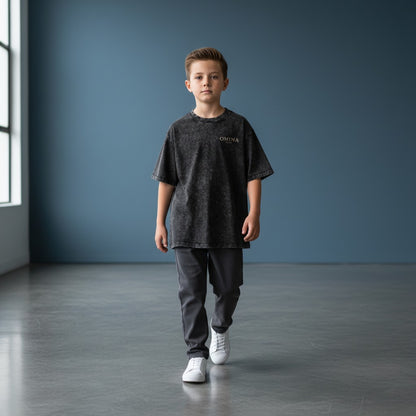 Omina Kids snow washed charcoal grey 100% cotton loose fit t-shirt with short sleeves and round neck.