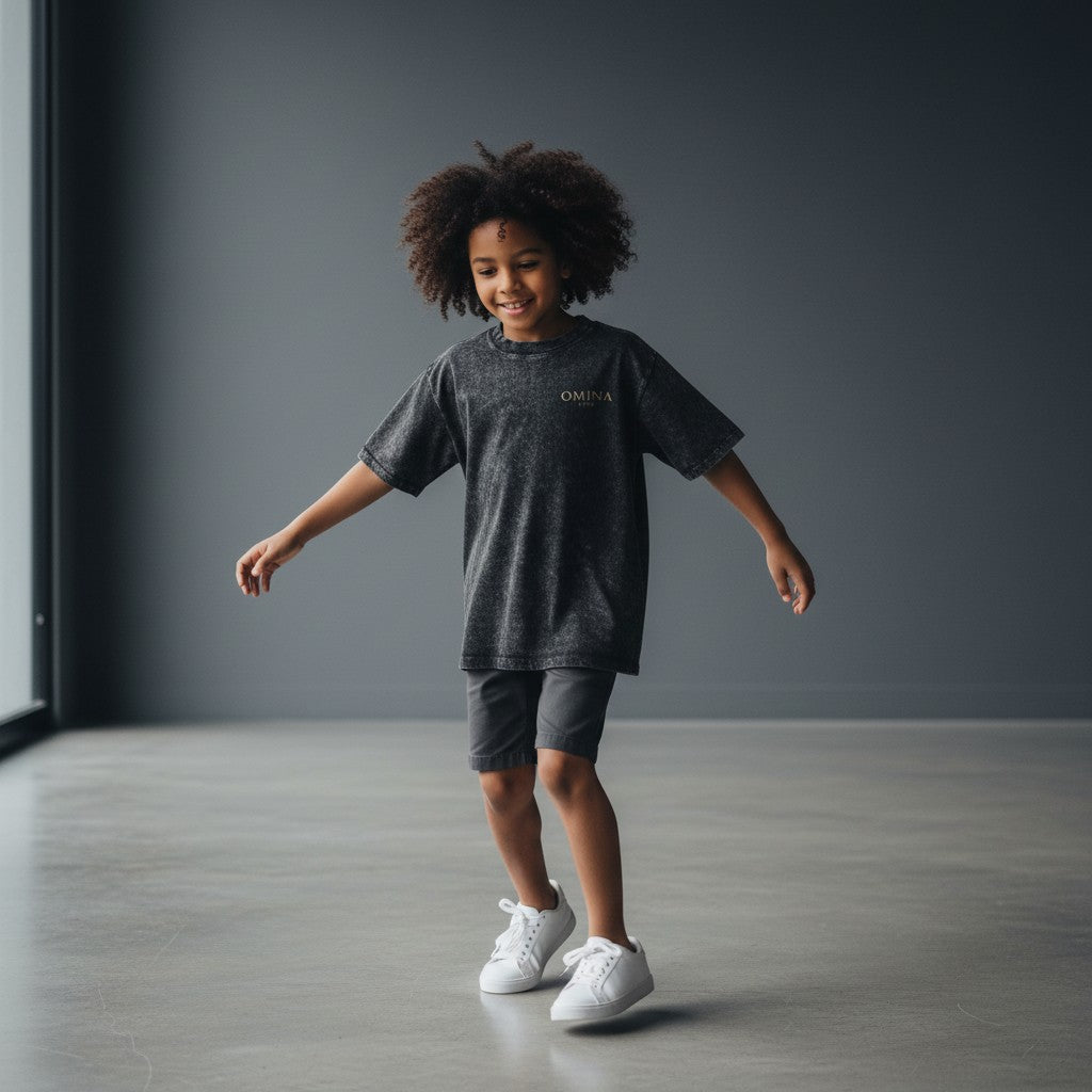 Omina Kids snow washed charcoal grey 100% cotton t-shirt with short sleeves and round neck.