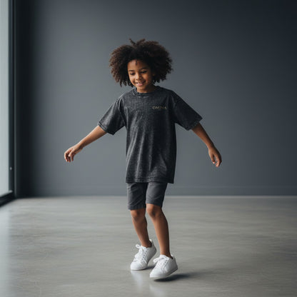 Omina Kids snow washed charcoal grey 100% cotton t-shirt with short sleeves and round neck.