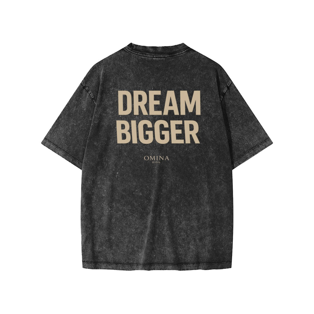 Omina Kids' snow-washed charcoal grey 100% cotton t-shirt with "DREAM BIGGER" graphic print.