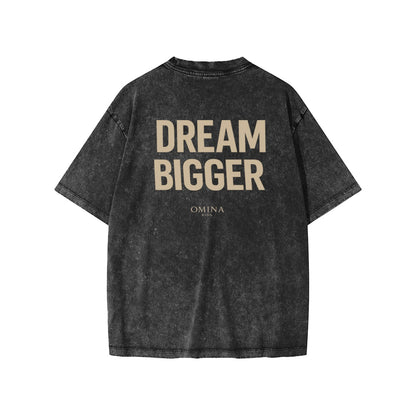 Omina Kids' snow-washed charcoal grey 100% cotton t-shirt with "DREAM BIGGER" graphic print.