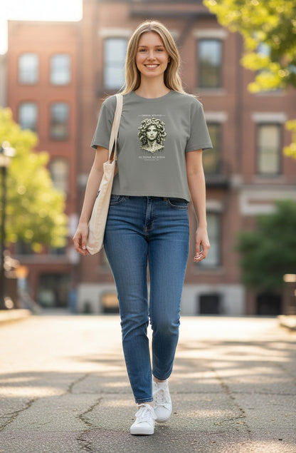 Omina grey cotton crop tee with Medusa graphic and "All Things All Within" text. Short sleeves, crew neck.