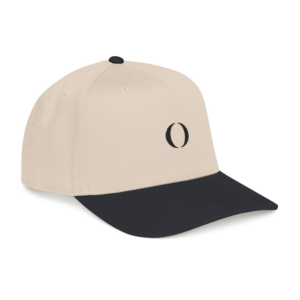 Omina structured 5-panel baseball cap in beige with a black brim and embroidered logo detail.