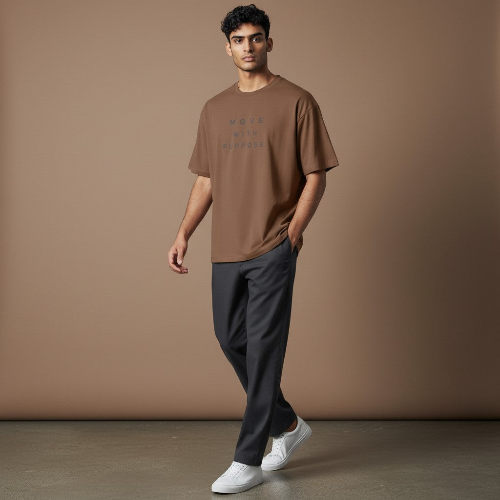 Omina brown heavyweight cotton t-shirt with "MOVE WITH PURPOSE." graphic on chest. Relaxed fit, crew neck.