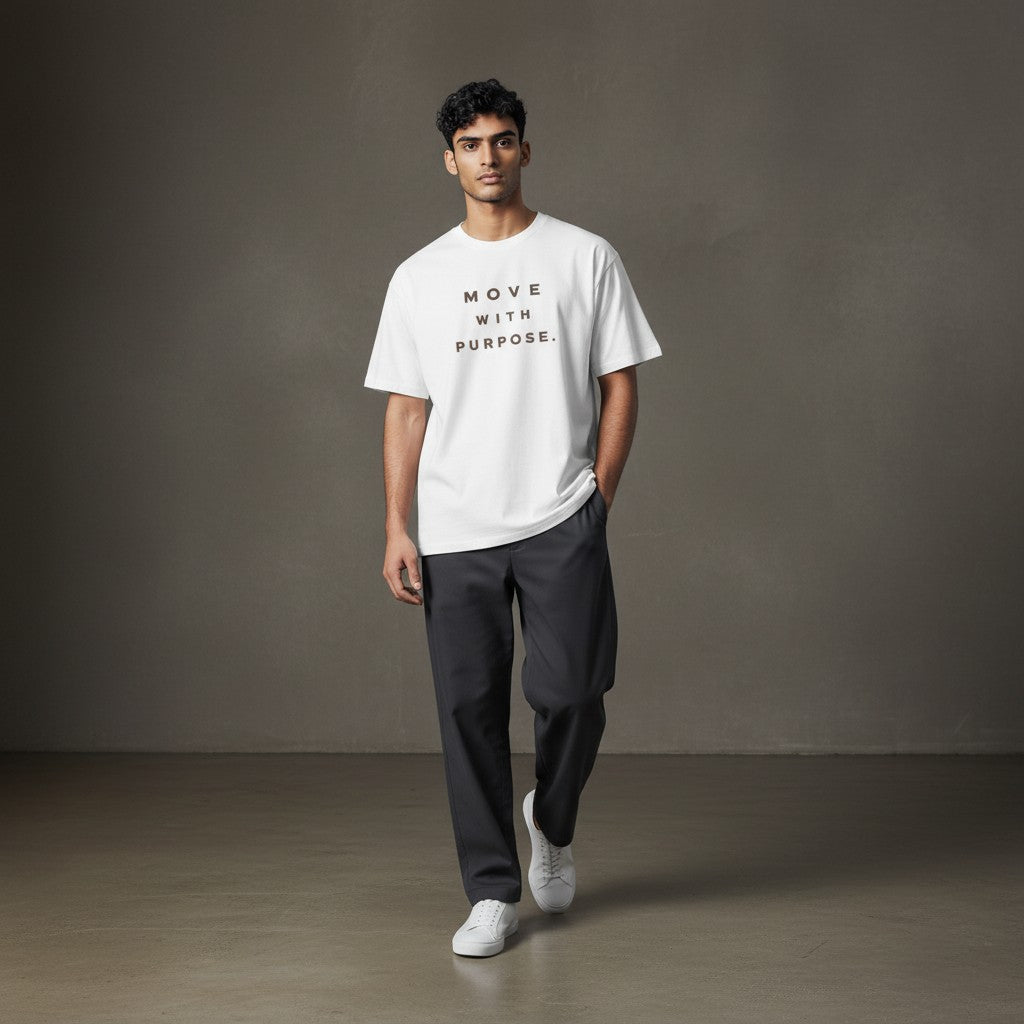 Omina white heavyweight cotton t-shirt with "MOVE WITH PURPOSE." printed in brown on the chest.