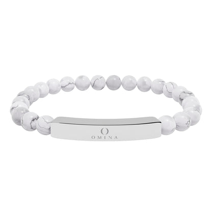 Omina natural stone stretch bracelet with white marble beads and a polished stainless steel engraved bar.