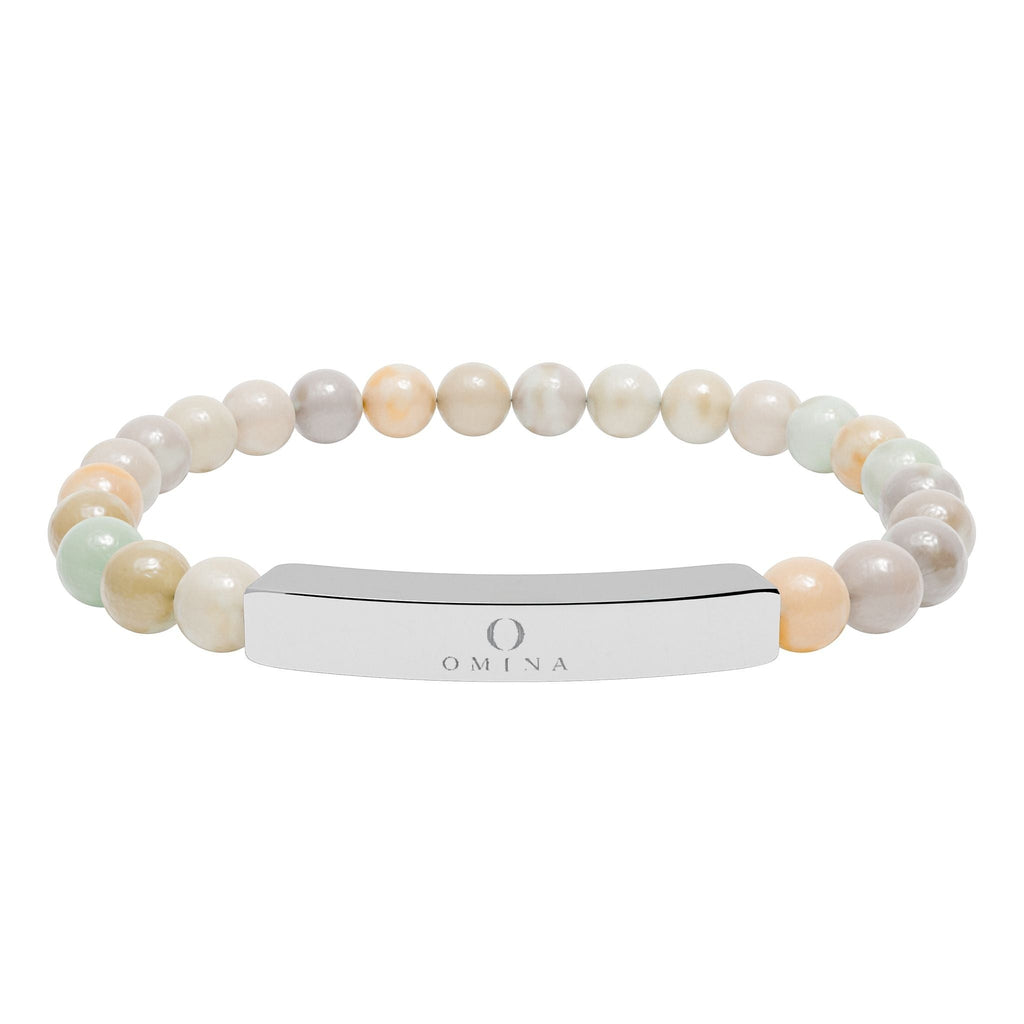 Omina natural stone stretch bracelet with neutral marbled beads and a polished stainless steel engraved bar.