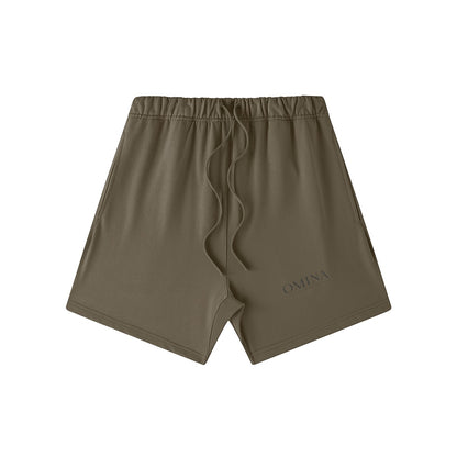 Omina Studio Taupe  heavyweight French terry shorts with drawstring and subtle logo detail.