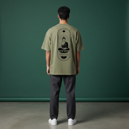 Model wearing an Omina heavyweight olive green t-shirt with a black Buddha graphic on the back, relaxed fit.
