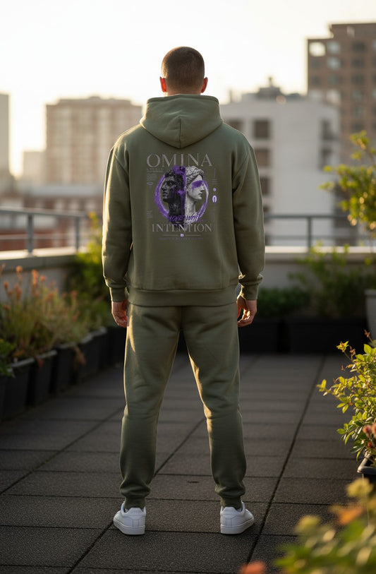 Omina Studio olive green heavyweight fleece pullover hoodie with a graphic print of two busts and text.