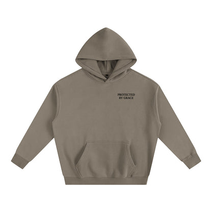 Omina Protected By Grace oversized taupe fleeced hoodie with drop shoulders and front pocket.