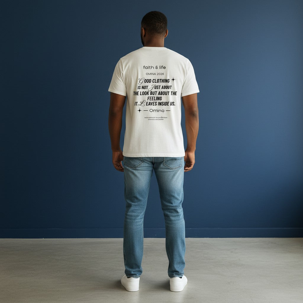 Man wearing a white Omina cotton t-shirt with black graphic text on the back, paired with blue jeans.