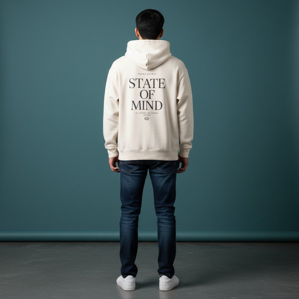 Omina Studio cream heavyweight hoodie with "State of Mind" graphic print on back. Relaxed fit, dropped shoulders, ribbed cuffs and waistband.