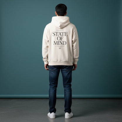 Omina Studio cream heavyweight hoodie with "State of Mind" graphic print on back. Relaxed fit, dropped shoulders, ribbed cuffs and waistband.