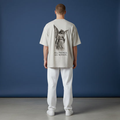 OMINA Studio light grey heathered cotton t-shirt with angel graphic and text "ALL THINGS, ALL WITHIN."