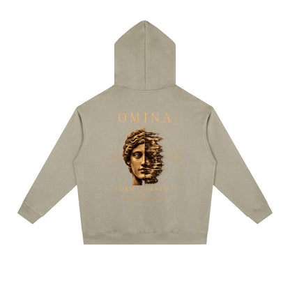 Omina Studio beige heavyweight fleece hoodie with a graphic print of a split face and text.