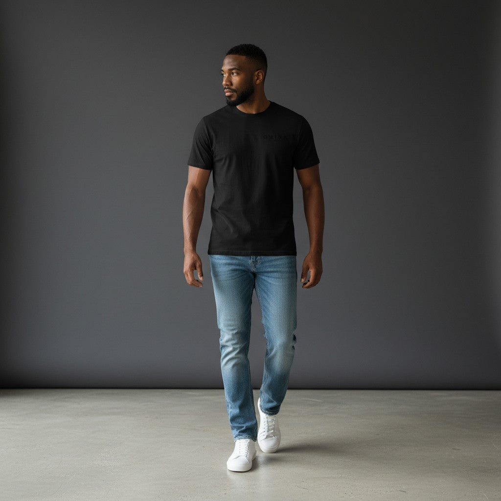 OMINA Studio black heavyweight cotton t-shirt with subtle chest graphic and relaxed fit.