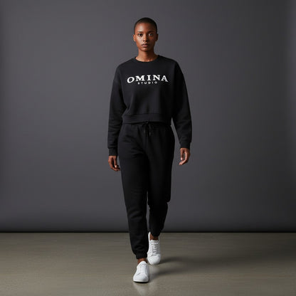 OMINA STUDIO black vintage washed cropped sweatshirt with oversized fit and drop shoulders.