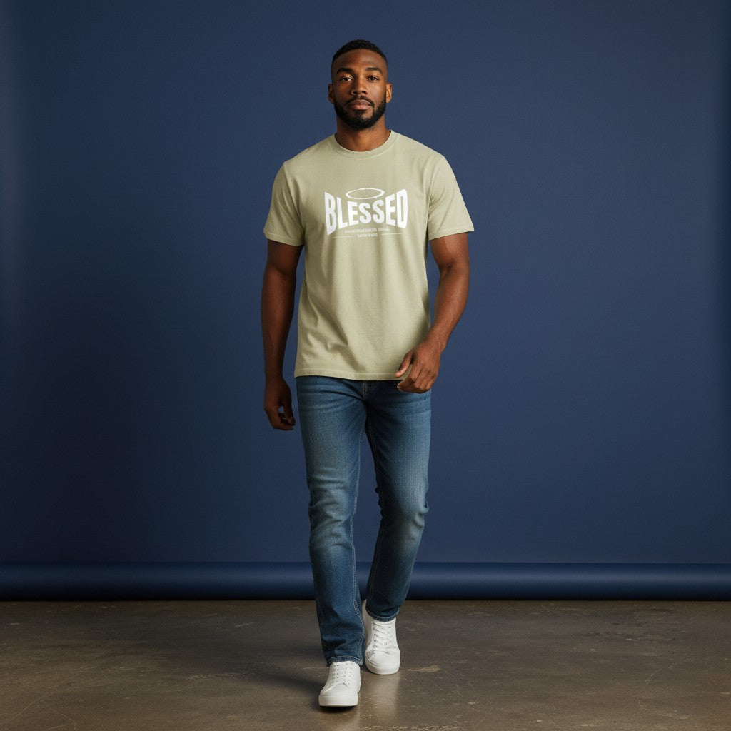 Omina Studio light green 100% cotton t-shirt with 'Blessed' graphic print and halo detail. Unisex, loose fit, short sleeves.