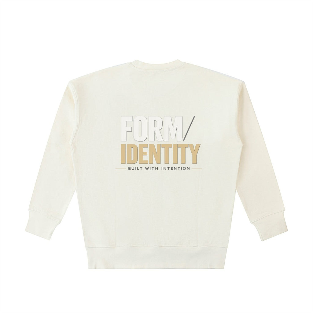 OMINA Studio cream heavyweight cotton sweatshirt with "FORM/IDENTITY BUILT WITH INTENTION" graphic on back.