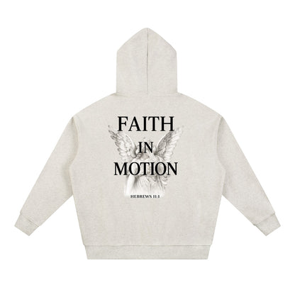 Omina Studio light heather grey heavyweight hoodie with "FAITH IN MOTION" text and angel graphic on back.