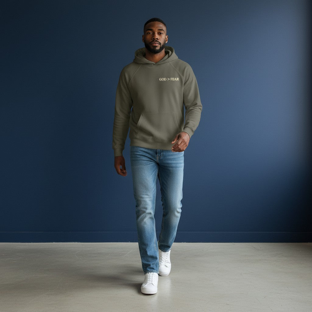 Omina Studio olive green heavyweight cotton pullover hoodie with "GOD > FEAR" graphic and kangaroo pocket.