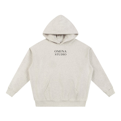 Omina Studio light grey heavyweight cotton blend hoodie with front pocket and minimalist logo.