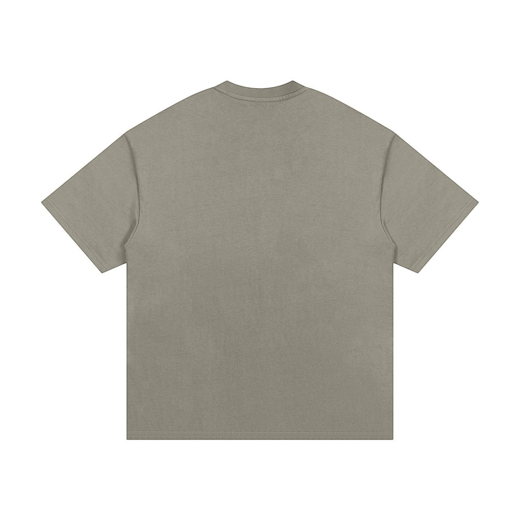 OMINA Studio heavyweight cotton t-shirt in taupe with an oversized relaxed fit and drop shoulders.