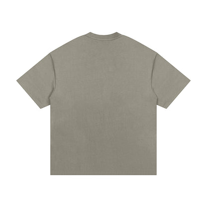 OMINA Studio heavyweight cotton t-shirt in taupe with an oversized relaxed fit and drop shoulders.