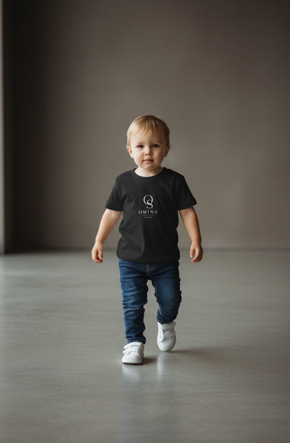 Omina Studio black infant t-shirt made from soft, breathable fine jersey cotton with a classic fit and minimalist logo.