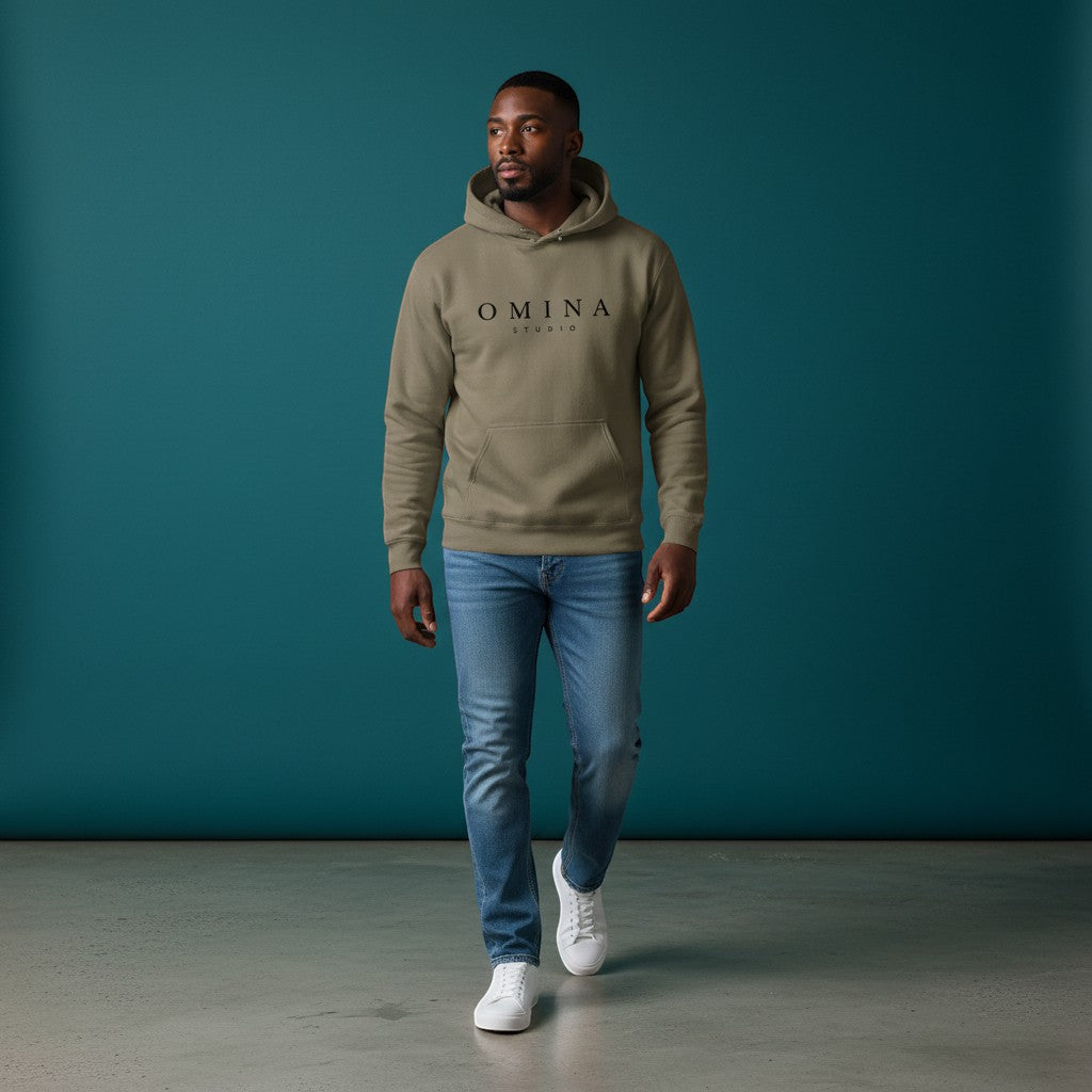 Omina Studio khaki pigment-dyed cotton blend hoodie with front logo and relaxed fit.