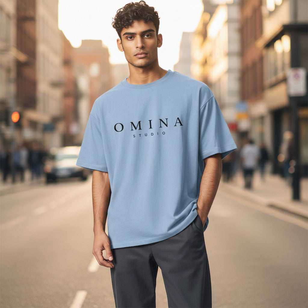 Omina Studio light blue 100% cotton unisex heavyweight t-shirt with relaxed fit and dropped shoulder.