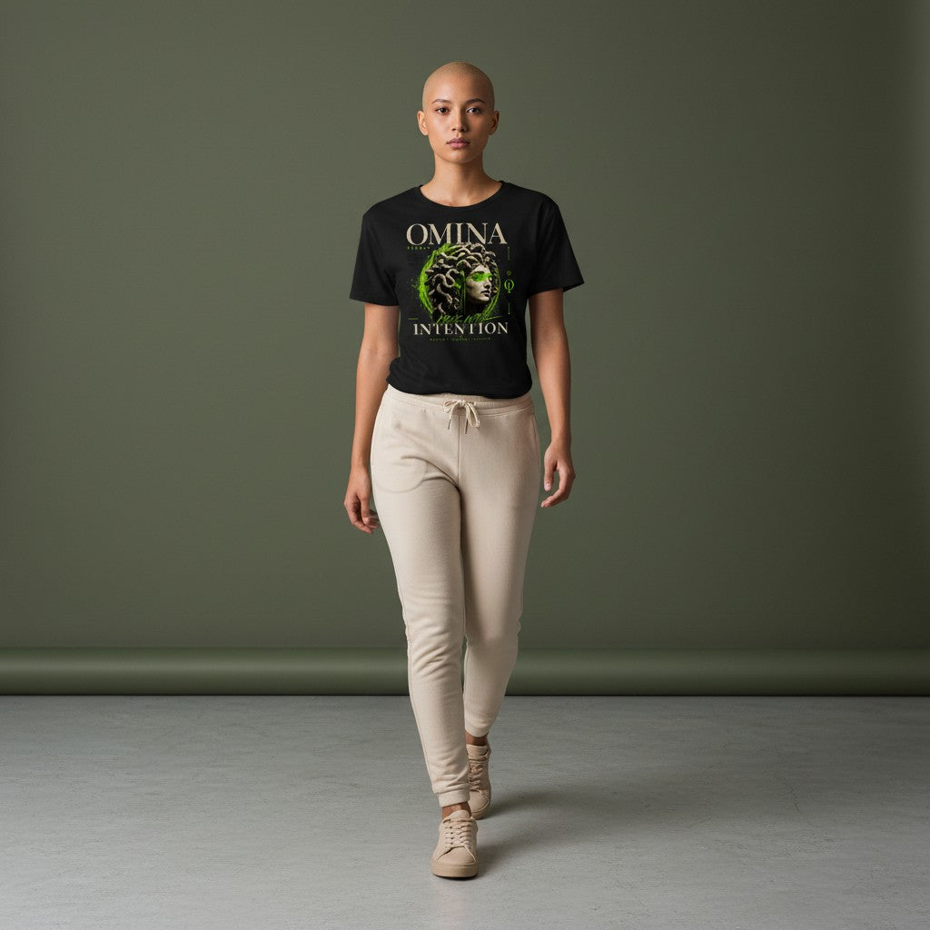 Omina Studio black cropped tee with Medusa bust graphic and "Move With Intention" text. Polyester-cotton blend.