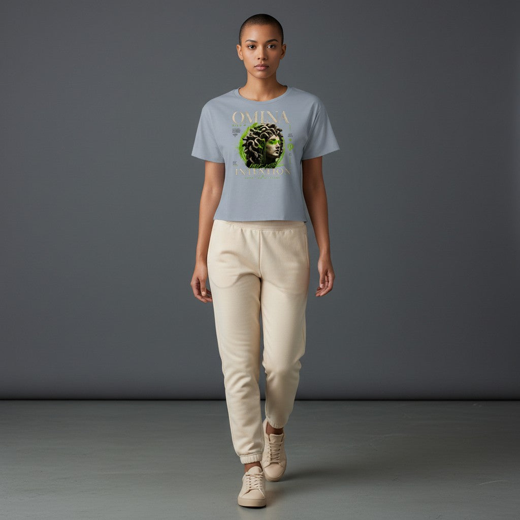 Omina Studio light blue cropped t-shirt with a graphic of Medusa's bust and the text "Move With Intention".