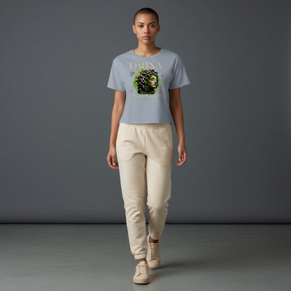 Omina Studio light blue cropped t-shirt with a graphic of Medusa's bust and the text "Move With Intention".