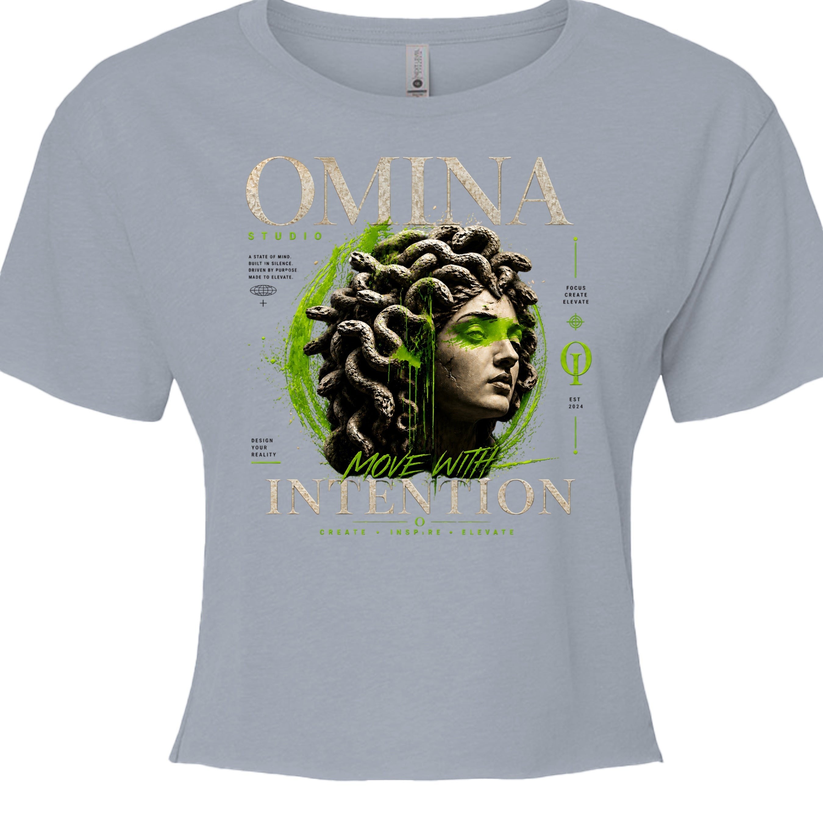 Omina Studio light blue cropped t-shirt with a Medusa bust graphic and gold text "Move With Intention".