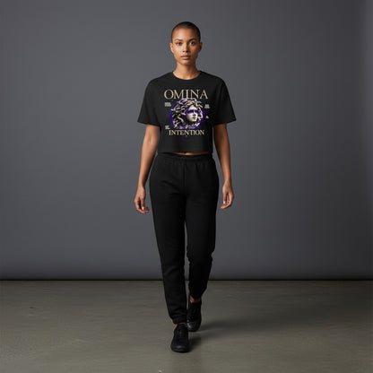 OMINA Studio black cropped heavyweight tee with Medusa graphic and "Move With Intention" text.