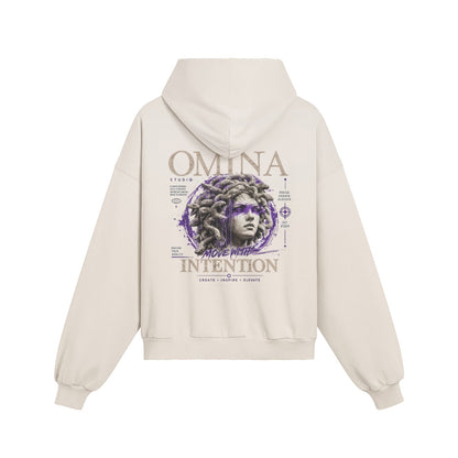 OMINA Studio heavyweight cream cotton hoodie with a graphic of Medusa and the text "Move With Intention" on the back.