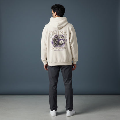 OMINA Studio heavyweight cream cotton hoodie with a graphic of Medusa and the text "Move With Intention" on the back.