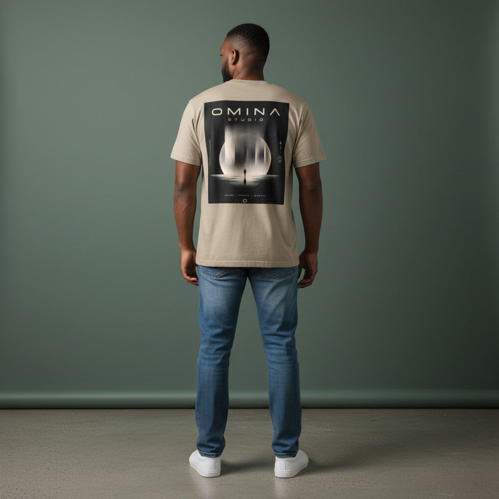 Omina Studio heavyweight cotton t-shirt in tan with a graphic print of a person standing before a large moon.