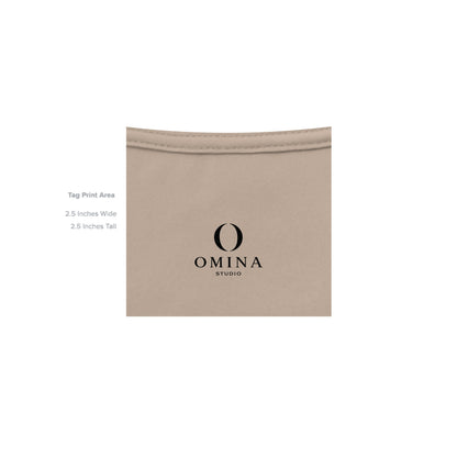 Omina Studio O Urban T-Shirt featuring a minimalist black O logo print on soft beige cotton fabric.