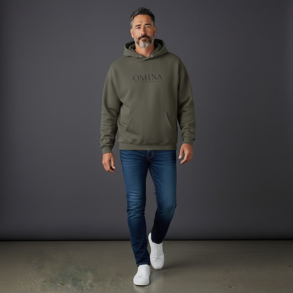 Omina Studio olive green heavyweight cotton hoodie with snap button high collar and kangaroo pocket.