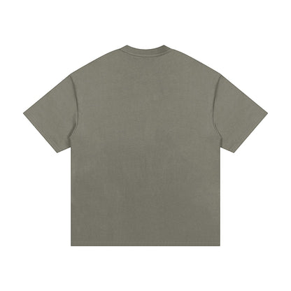 OMINA Studio heavyweight cotton t-shirt in olive green with an oversized relaxed fit and drop shoulders.