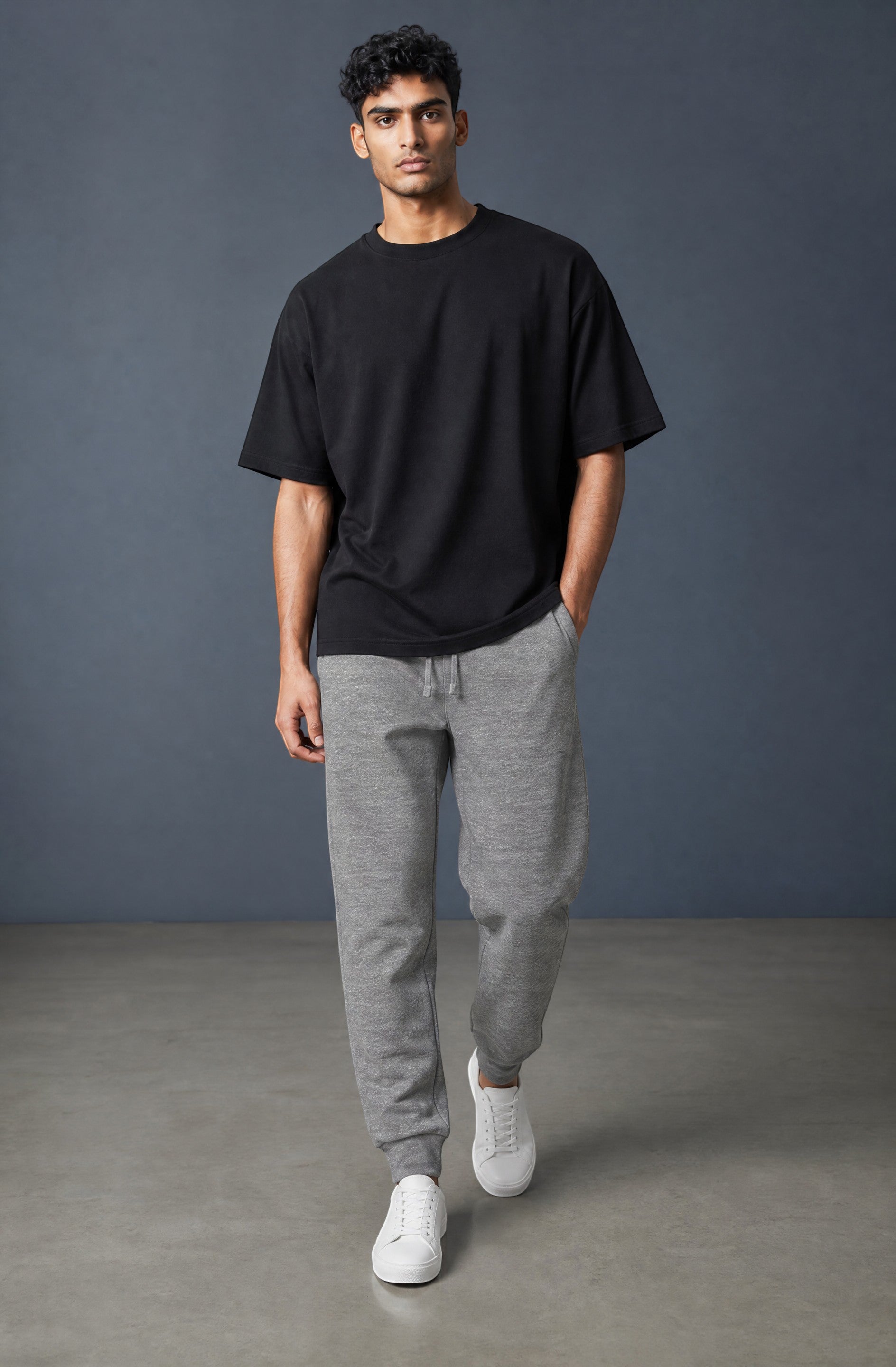 OMINA Studio Premium Joggers in heather grey, made from 8.5 oz heavyweight fleece with a tapered fit and ribbed cuffs.